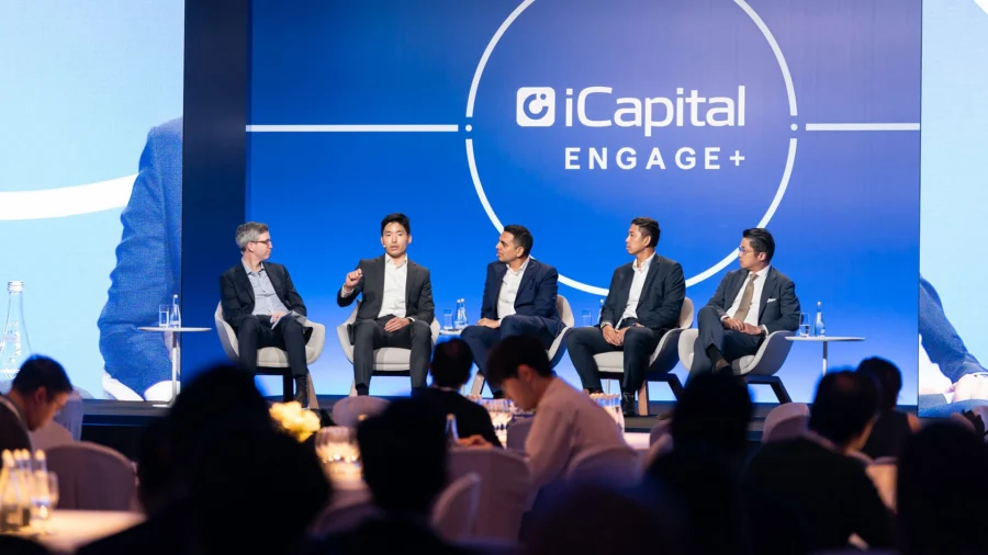 Sam Williams on stage at iCapital Engage