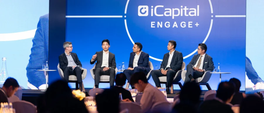 Sam Williams on stage at iCapital Engage
